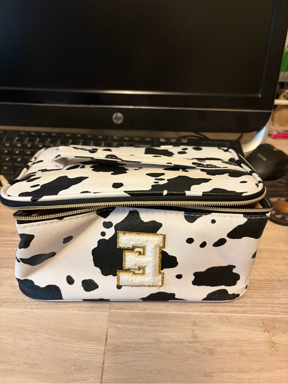 Vasque Black and White Cow Print Cosmetic Train Case
